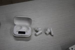 lot 47 image: Earbuds with Charger Case