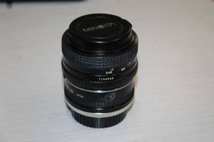 lot 59 image: Toyo Optics Tele Converter 2x with Minolta Lens Cap