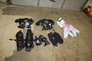 lot 92 image: Lot of  Assorted Youth Athletic Apparel - Shoulder Pads, Knee Pads, Various Pads