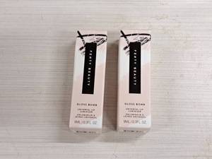 lot 190 image: Lot of (2) Fenty Beauty by Rihanna Gloss Bomb 0.3-fl.oz. Hot Chocolit Fantasy #09 Universal Lip Luminizer
