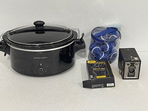 lot 100 image: Slow Cooker, Camera, Tennis Balls