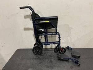 lot 238 image: Carex Steel Transport Wheelchair with 19 Seat, Swing-Away Footrests