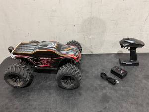 lot 32 image: JLB Racing Cheetah 110 Scale RC Car Truck, 80 KMH High Speed RTR RC Truck