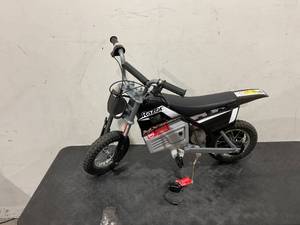lot 52 image: Razor MX350 Dirt Rocket  14 MPH (22 KMH) Off-Road Electric Dirt Bike, High-Torque Motor