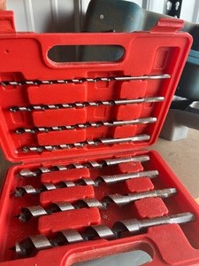 dust pan  makita case  and drill bits