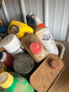 box of oils and chemicals