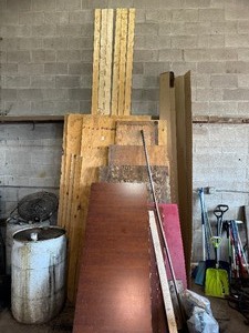 Pile of Wood - Sheets of Plywood, Thirteen Foot 2x4s, Disassembled Desk and More
