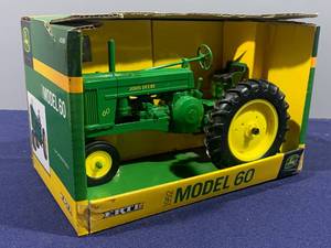 lot 1 image: JOHN DEERE 1952 MODEL 60 - NIB