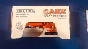lot 5 image: CASE 1942-55 MODEL VAC - NIB