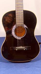 lot 56 image: LEARNING INSTRUMENTS CRESCENT YOUNG ADULT GUITAR AND LEARNERS VIOLIN.