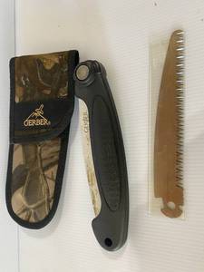 lot 37 image: KNIVES AND SAWS