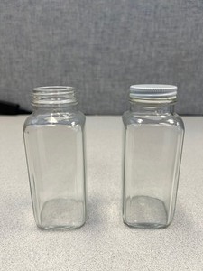 lot 138 image: 84 - 250ml French Square Bottles, 22 Have Caps, The Rest Do Not Have Caps