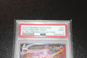 lot 25 image: 2022 Pokemon Black Star Promo Charizard VMAX #SWSH261 PSA 9