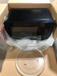 Vissani 1.1 cu. ft. Countertop Microwave Oven in Black  Customer Returns see Pictures