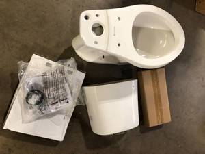 Glacier Bay Power Flush 12 inch Rough In Two-Piece 1.28 GPF Single Flush Elongated Toilet in White Seat Included Customer Returns see Pictures