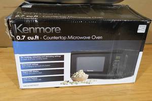lot 42 image: Kenmore .7cu ft Countertop Microwave Oven