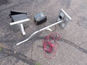 lot 12 image: Strong Arm Winch 12v with Solar panel and Battery Holder