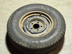 lot 3 image: ST22575R15 Tire and Rim Plenty of Life Left