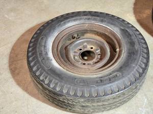 lot 13 image: Used CO-OP Tire and Rim 7.00-15LT