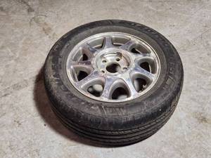 lot 24 image: Used Tire and Rim 22560R16