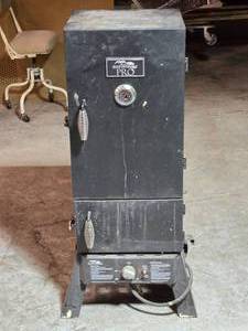 lot 56 image: Masterbuilt Pro Propane Smoker with Cover