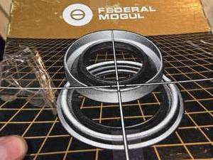lot 101 image: Lot of 3 National 380023A Gold 38 Series Wheel Seals for 34,000 lb Drive Axles