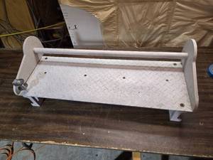 lot 123 image: Strap Holding Rack
