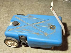 lot 137 image: 4 Wheel RV Dump Tote