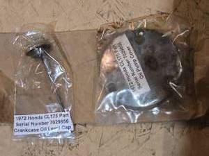 lot 160 image: 1972 Honda CL175 Parts - Oil Pump Cover and Dipstick