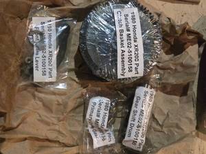 lot 237 image: 1980 Honda XR200 Parts Clutch Basket, Gear Shift Drum, Front Brake Lever, Primary Drive Gear