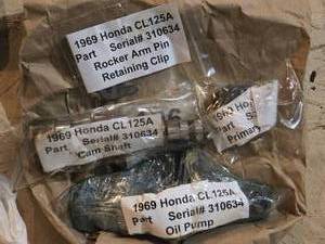 lot 279 image: 1969 Honda CL125A Vintage Motorcycle Parts Rocker Arm Pin, Cam Shaft, Oil Pump