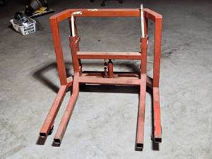 lot 323 image: Semi Truck Tire Jack  Wheel Dolly