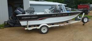 Smoker Craft fishing boat with 75hp Mercury and trailer