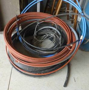 Group of hose and barrel of pipe