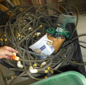 Large bunch of garden drip hose