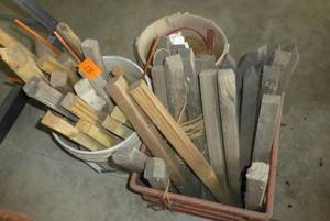 pile of wood garden stakes and twine
