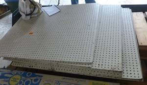 EIGHT pieces of pegboard 42x47 inches