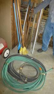 Garden Hose and all the stuff in the corner, broom, chisel, maul, axe etc