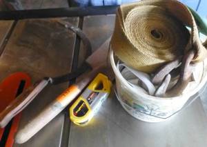 level, shovel, scythe, towstrap