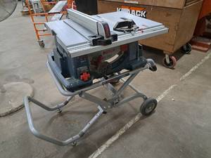 lot 30 image: Bosch Gravity Rise Folding Table Saw TS3000