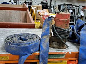 lot 74 image: Sump Pump with Hose