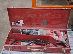 lot 99 image: Milwaukee Sawzall Heavy Duty Reciprocating Saw with Metal Case