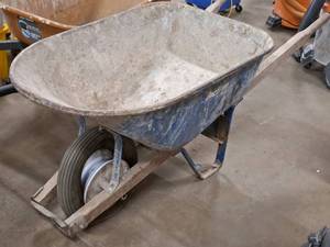 lot 197 image: Metal BasinWood HandleRubber Tire Wheelbarrow