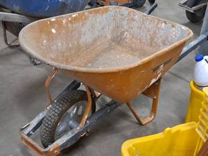 lot 198 image: Metal BasinWood HandleRubber Tire Wheelbarrow