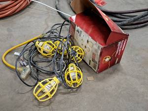 lot 277 image: (1) 50 String of Yellow Work Lights (New), (1) String of work Lights, (1) Plug Connector