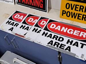 lot 306 image: Lot of (4) Plastic DANGER HARD HAT AREA Signs