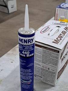 lot 541 image: Lot of (1) Henry 440 Cove Base Advesive 30-fl.oz. Tube