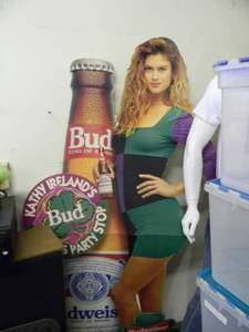 lot 31 image: RARE ORIGINAL Kathy Ireland Budweiser St. Pats Party Stop LIFE SIZE CARBOARD BAR SIGN - NICE - AWESOME OLD SCHOOL PIECE - APPROX 31 By 72 - SEE PICTURES