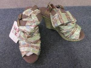 Size 7 MukLuks Wedges...