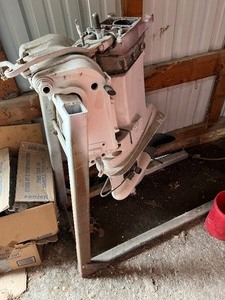 lot 61 image: Old Boat Motor  in boxes and stand